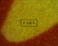 ABBOTT AND COSTELLO MEET FRANKENSTEIN LOBBY CARD - Here we see a close up of the "O" in Costello (The microscope camera reverses the image) and in both the yellow background and the red letter we can clearly see the ink jet patterns. (Poster)
